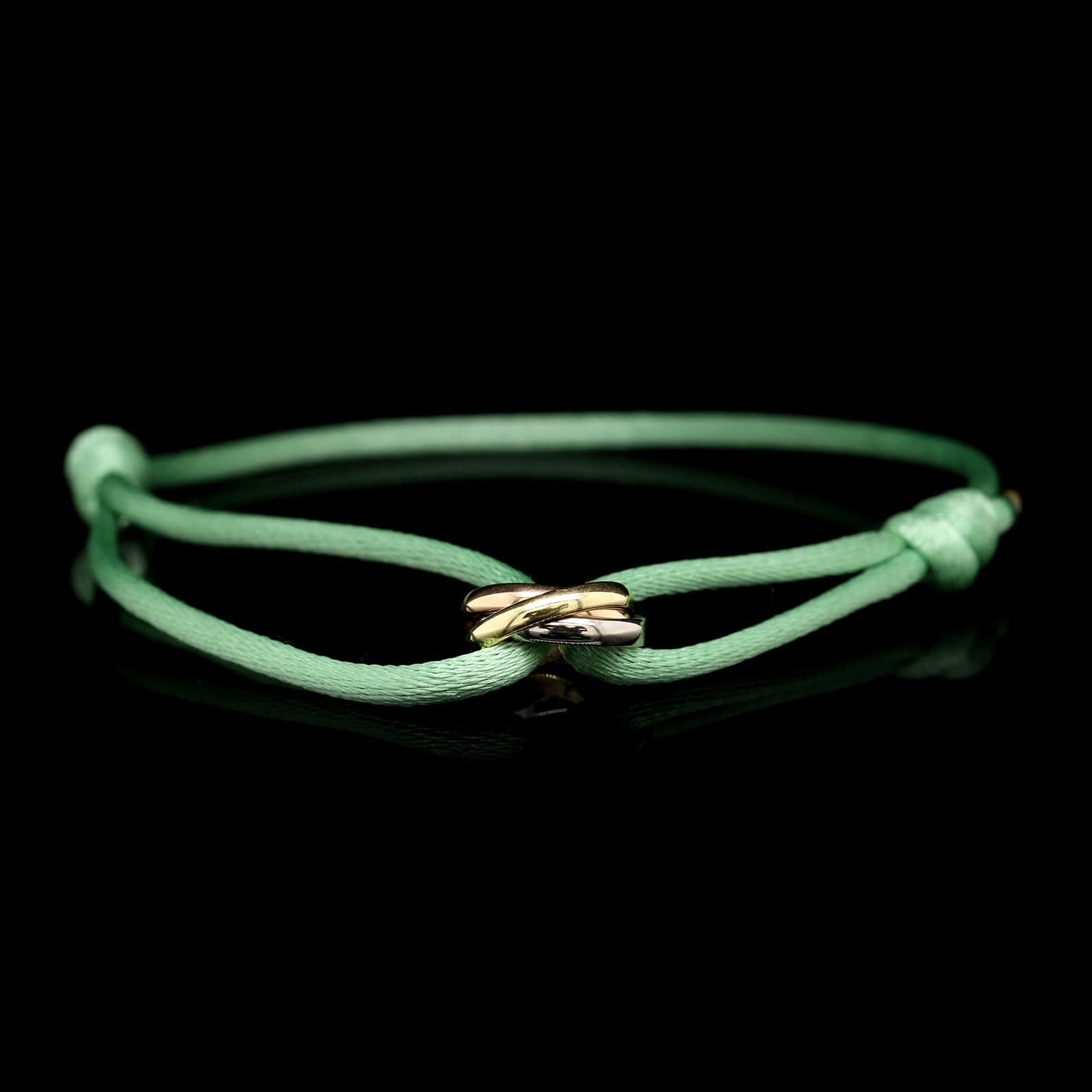 Cartier 18K Tricolor Gold Estate Trinity Bracelet on Green Silk Cord