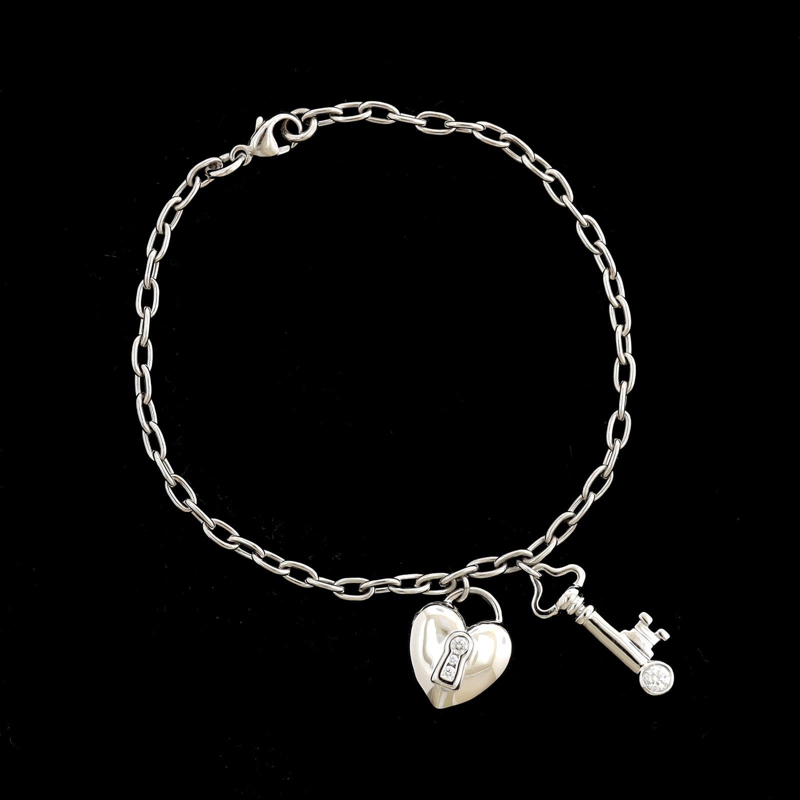 Tiffany & Co. Platinum Estate Heart Lock and Key Bracelet – Long's
