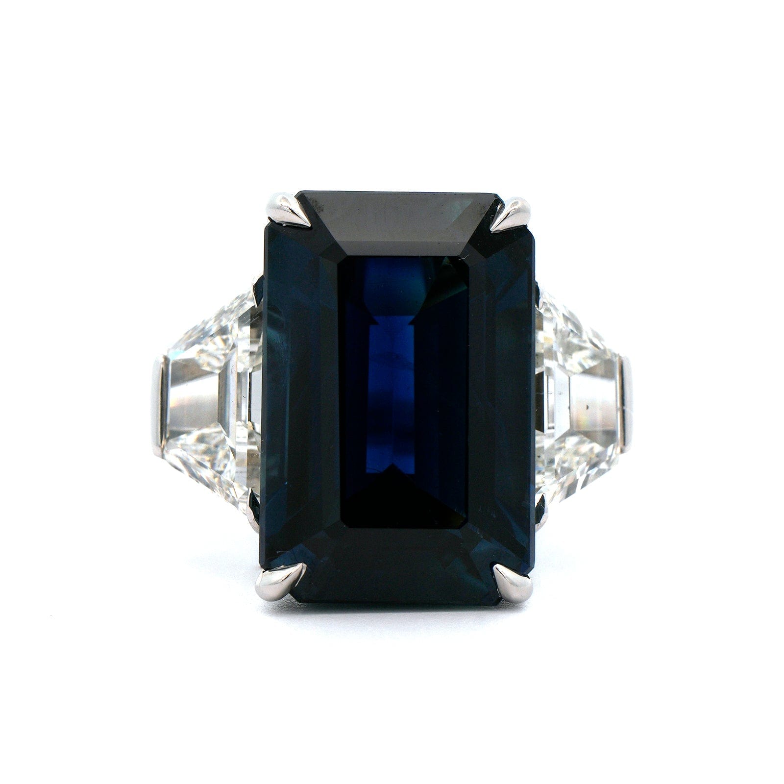 Platinum Emerald Cut Sapphire and Trapezoid Diamond Ring