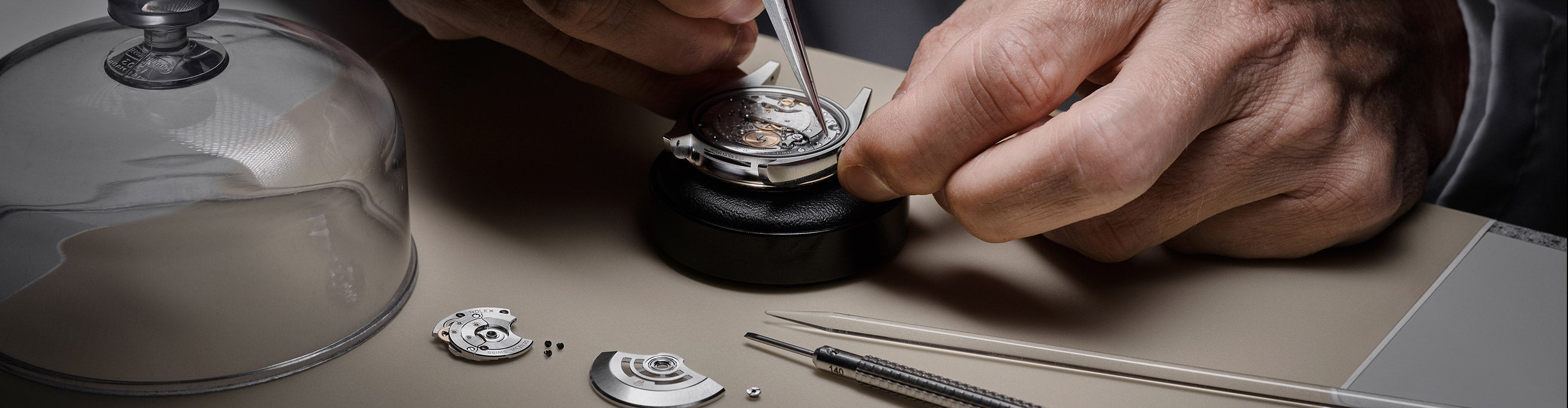 Jeweler working on a watch