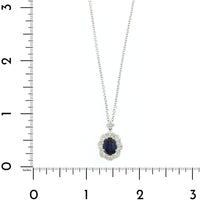 Platinum and 18K White Gold Oval Shaped Sapphire and Diamond Halo Necklace