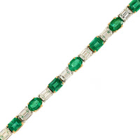 Platinum and 18K Yellow Gold Alternating Oval Emerald and Emerald Cut Diamond Tennis Bracelet