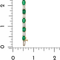 Platinum and 18K Yellow Gold Alternating Oval Emerald and Emerald Cut Diamond Tennis Bracelet