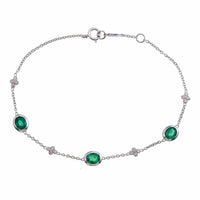 18K White Gold Bezel Set Emerald and Round Diamond Cluster Bracelet