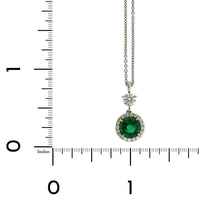 Platinum Emerald and Diamond Halo Pendant