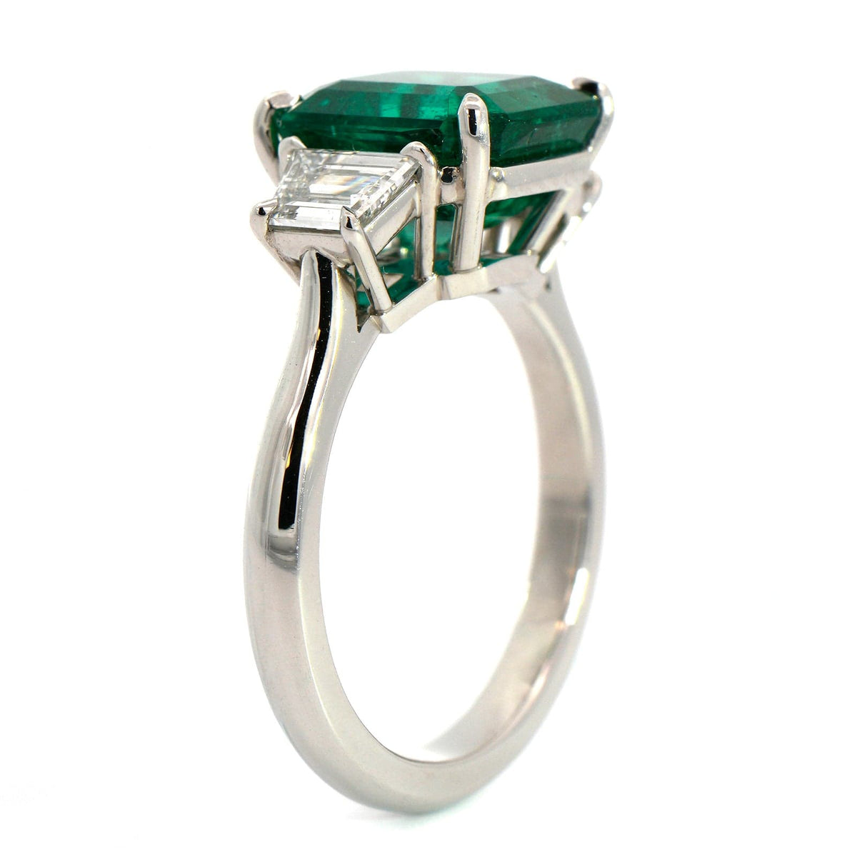 Platinum Emerald and Diamond 3 Stone Ring