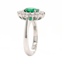 Platinum Round Emerald and Diamond Halo Ring