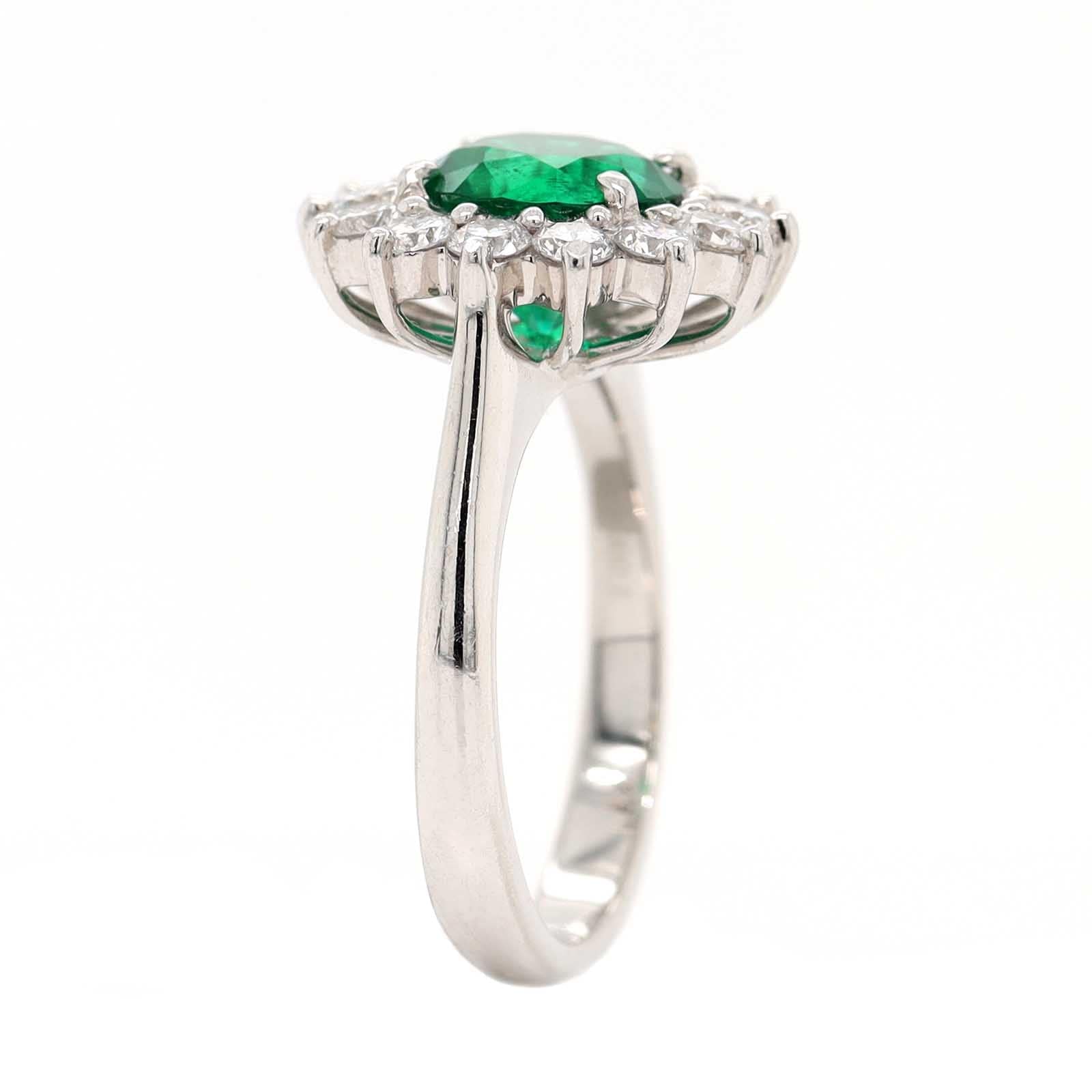 Platinum Round Emerald and Diamond Halo Ring