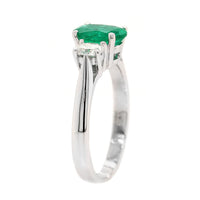 Platinum 3 Stone Oval Emerald and Diamond Ring