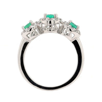 Platinum 3 Stone Oval Emerald and Diamond Halo Ring