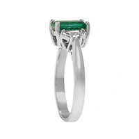 Platinum 3 Stone Emerald and Cadillac Diamond Halo Ring