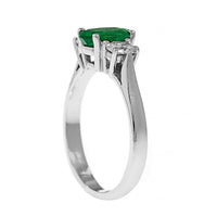 Platinum 3 Stone Oval Emerald and Diamond Halo Ring