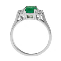 Platinum 3 Stone Oval Emerald and Diamond Halo Ring