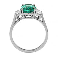 Platinum 3 Stone Oval Emerald and Diamond Ring