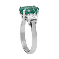 Platinum 3 Stone Oval Emerald and Diamond Ring