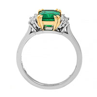 Platinum Three Stone Emerald and Trapezoid Shaped Diamond Ring