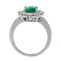 Platinum Oval Emerald and Diamond Halo Ring