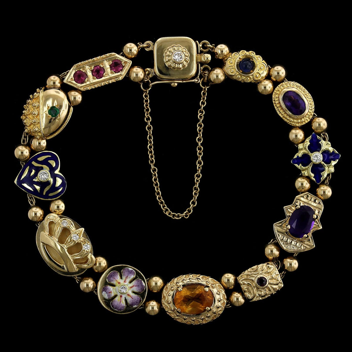 Late 1800s Slide Bracelet, Mixture Of 14K, 10K, And Gold Filled Charms –  Yarnal Jewelers