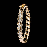14K Two-tone Gold Estate Diamond Twist Bangle Bracelet