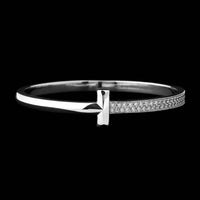 Tiffany & Co. 18K White Gold Estate T Wide Diamond Bangle