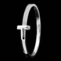 Tiffany & Co. 18K White Gold Estate T Wide Diamond Bangle