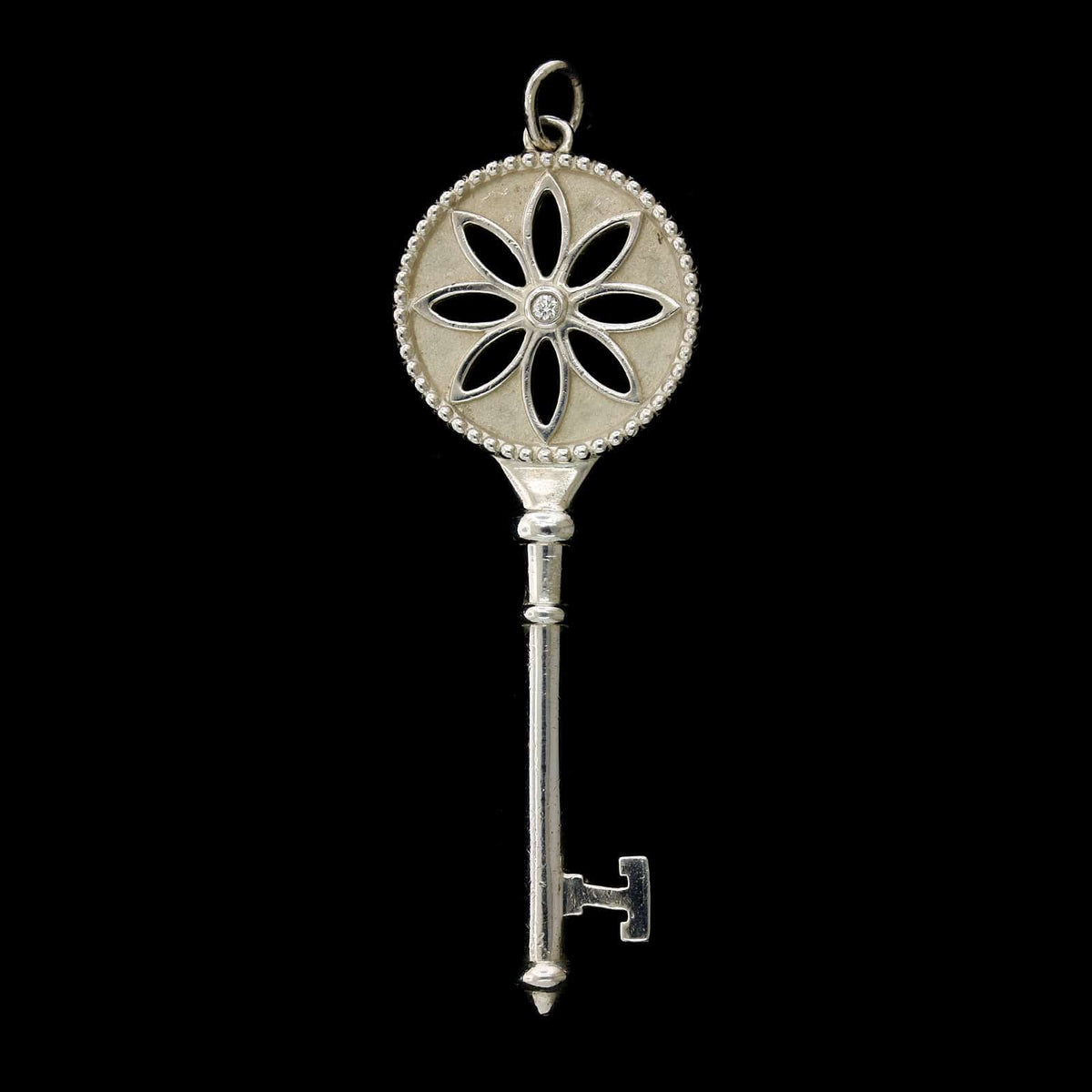 Tiffany & Co. Sterling Silver Estate and Diamond Daisy Key Pendant