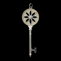 Tiffany & Co. Sterling Silver Estate and Diamond Daisy Key Pendant