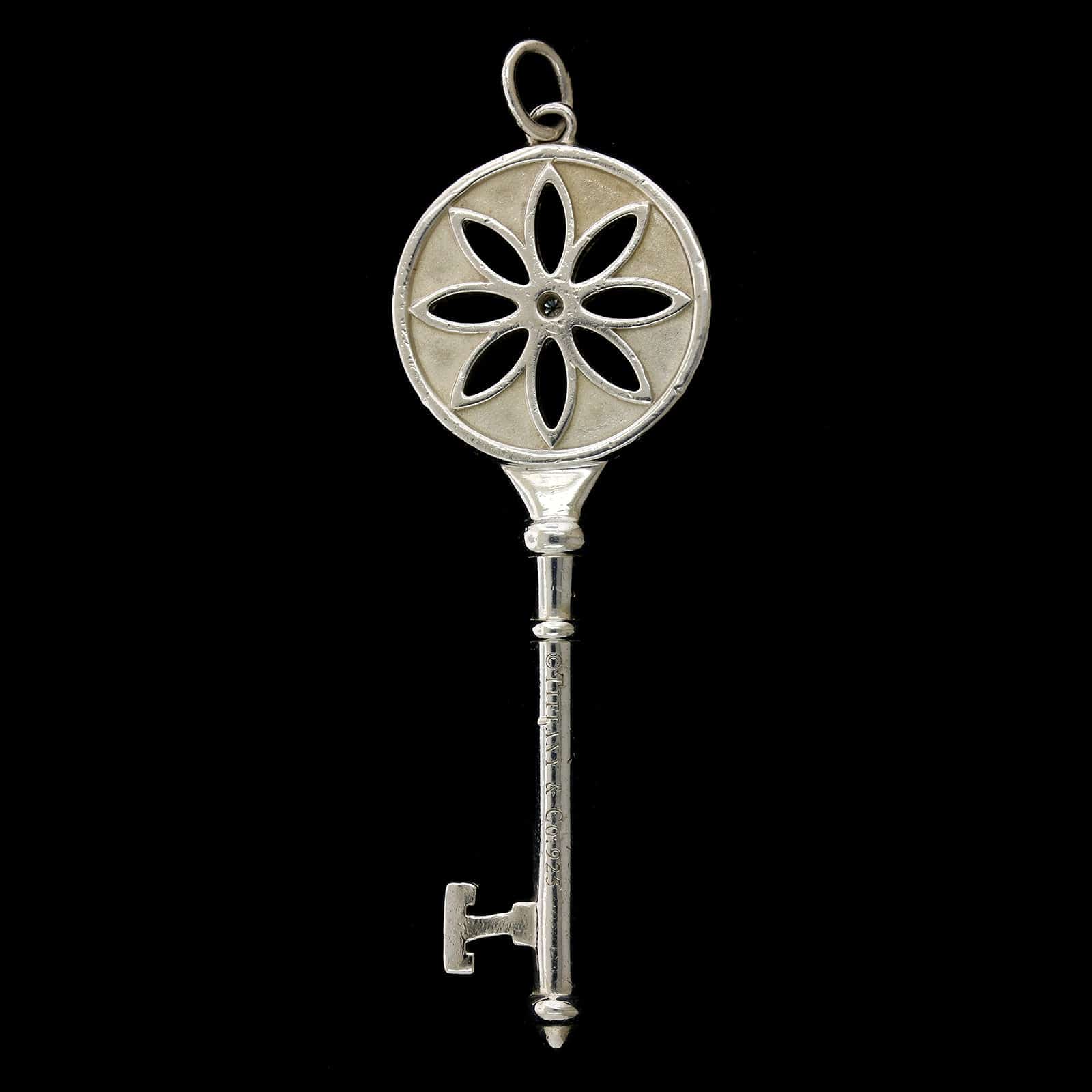 Tiffany & Co. Sterling Silver Estate and Diamond Daisy Key Pendant