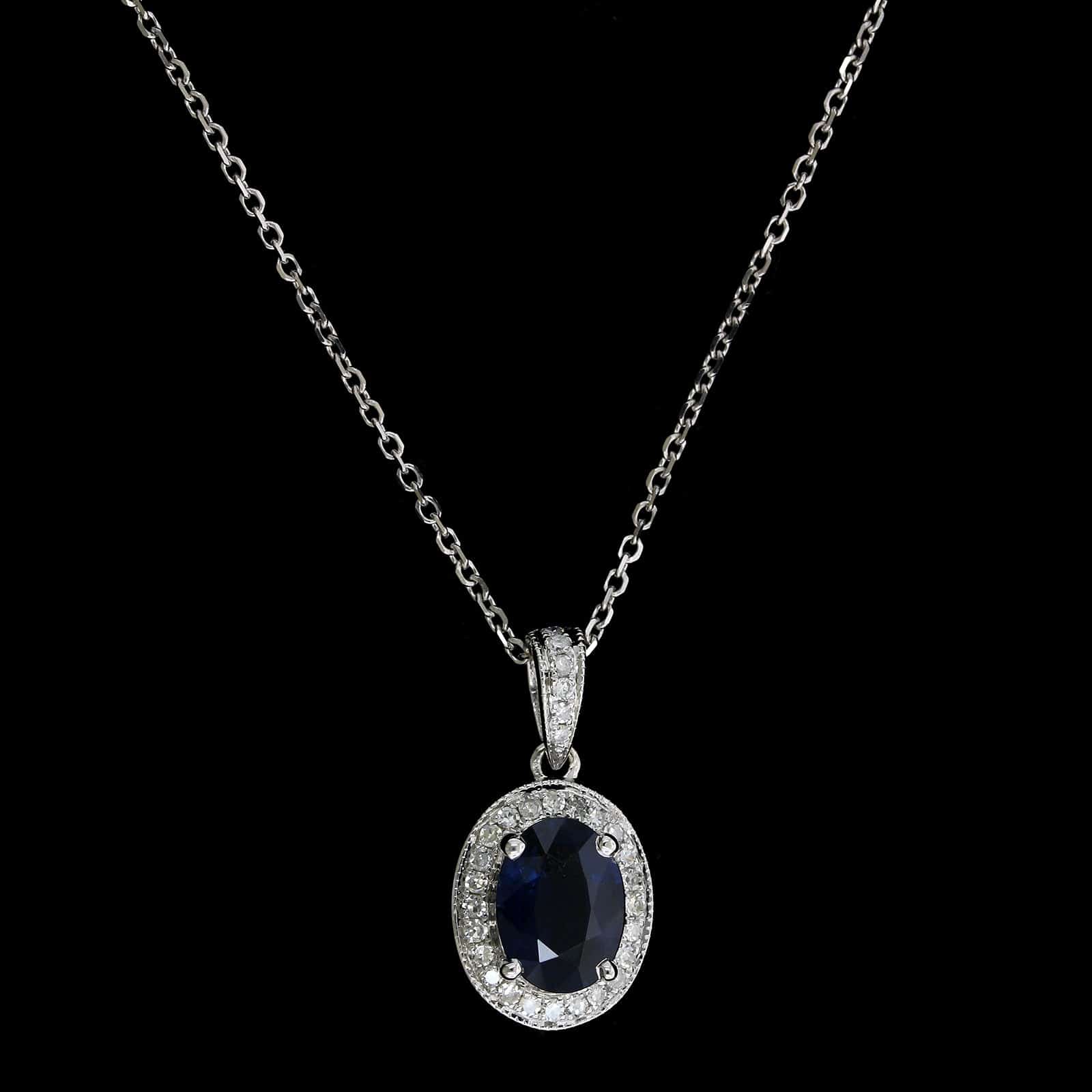 14K White Gold Estate Sapphire and Diamond Halo Pendant