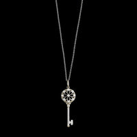 Tiffany & Co. 18K White Gold Estate Diamond Flower Key Pendant Necklace