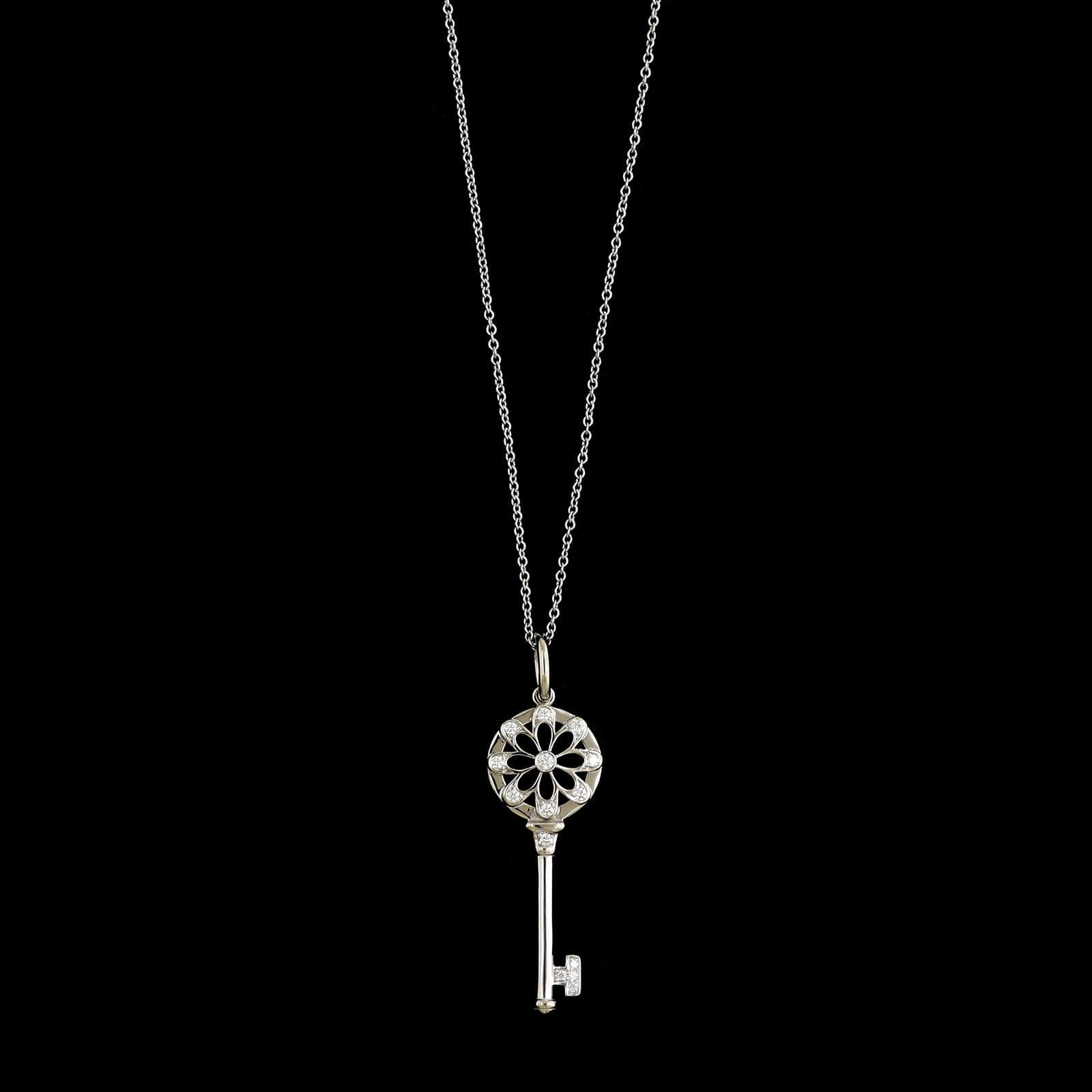 Tiffany & Co. 18K White Gold Estate Diamond Flower Key Pendant Necklace