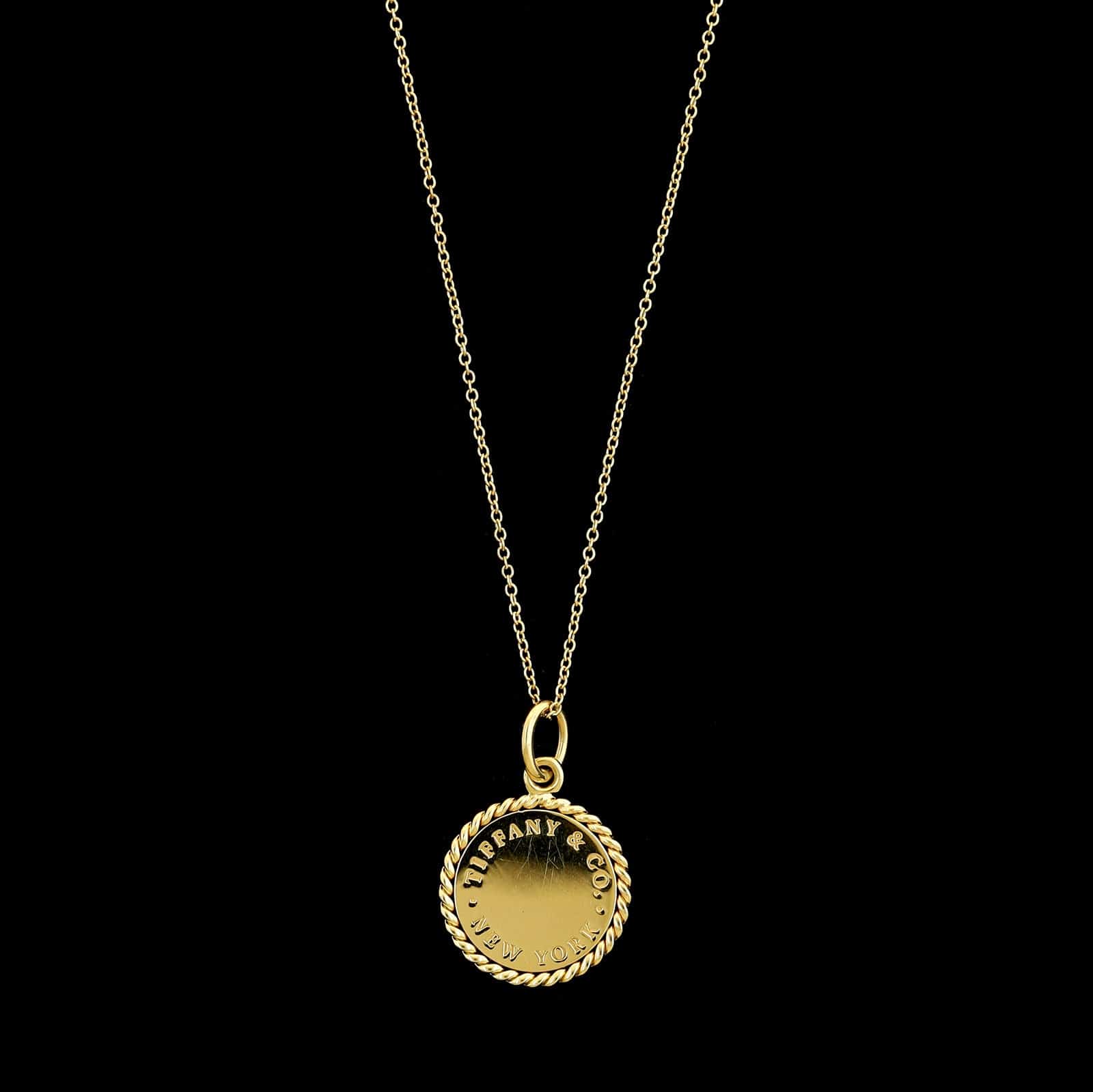 Tiffany & Co. 18K Yellow Gold Estate New York Disc Pendant