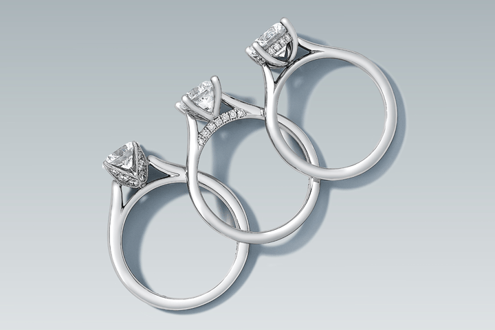 Three platinum engagement ring settings