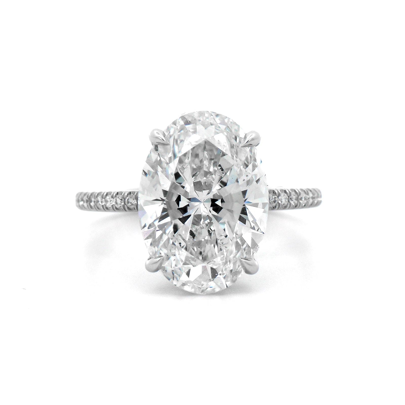Platinum Oval Cut and Hidden Diamond Halo Engagement Ring