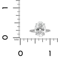 Platinum Oval Cut and Hidden Diamond Halo Engagement Ring