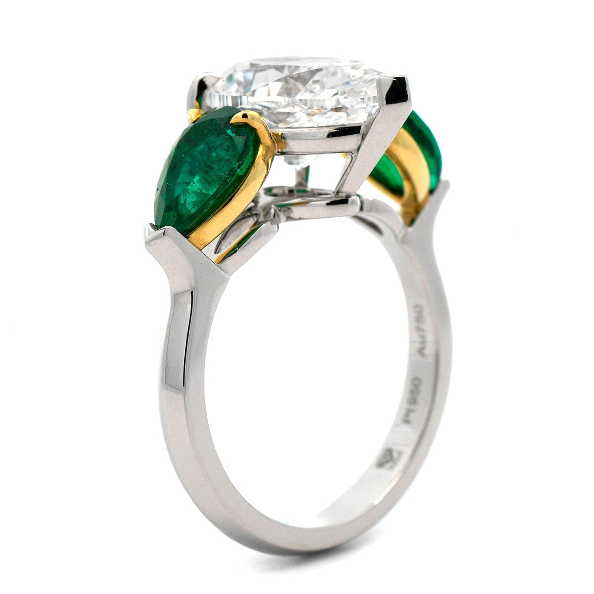 Platinum Diamond and Pear shaped Emerald Ring
