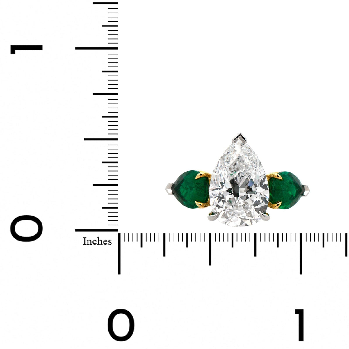 Platinum Diamond and Pear shaped Emerald Ring