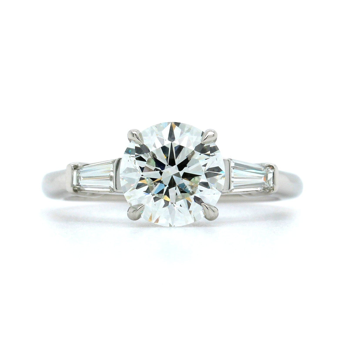 Platinum Round Diamond with Baguette Sides Engagement Ring