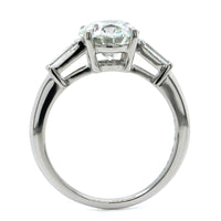 Platinum Round Diamond with Baguette Sides Engagement Ring