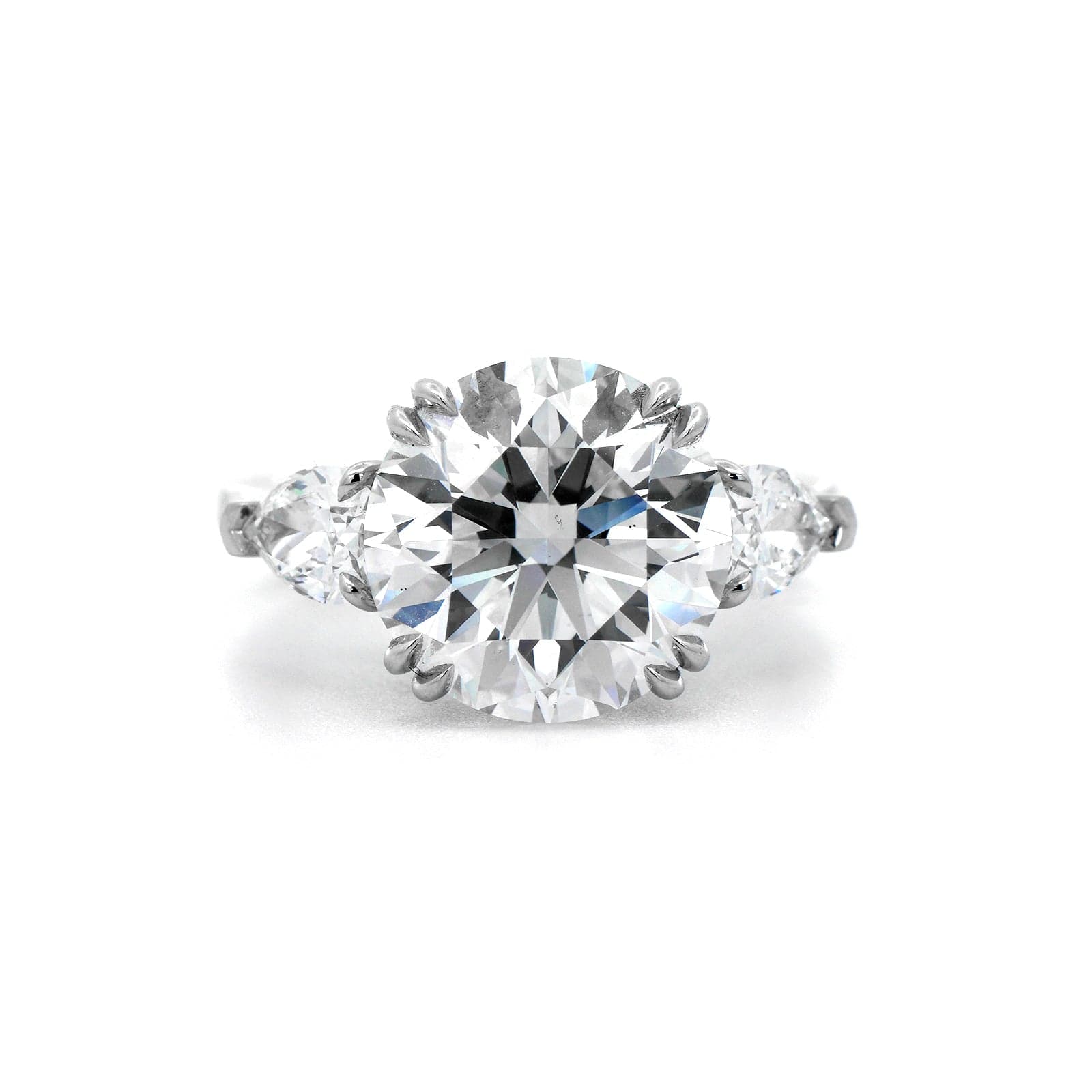 Platinum 3 Stone Round and Pear Shaped Diamond Engagement Ring