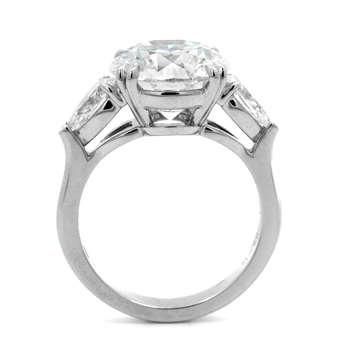 Platinum 3 Stone Round and Pear Shaped Diamond Engagement Ring