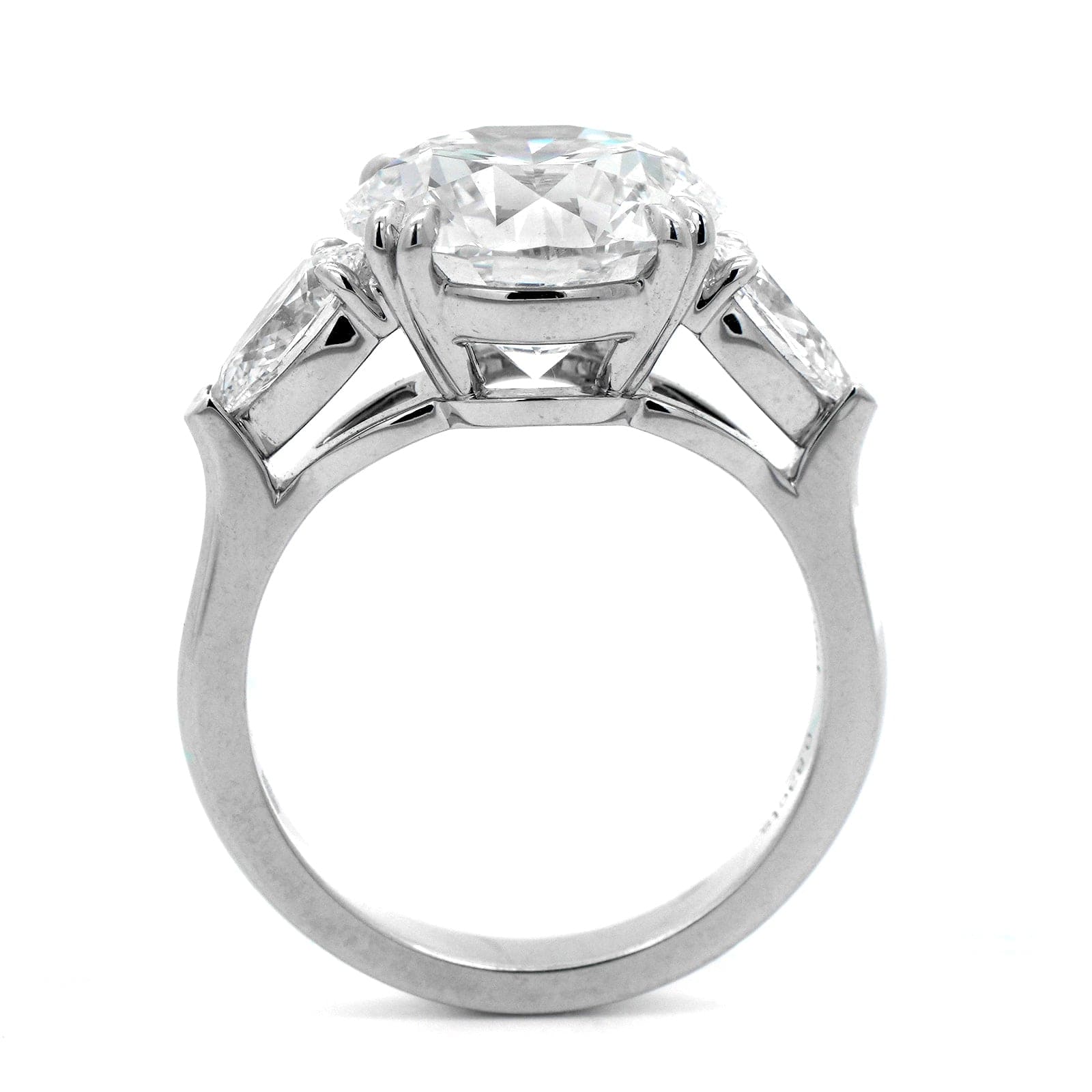 Platinum 3 Stone Round and Pear Shaped Diamond Engagement Ring