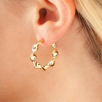 14K Yellow Gold Medium Flat Twisted Hoop Earrings