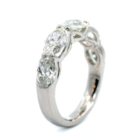 Platinum Shared Prong Oval Cut Graduating Diamond Band