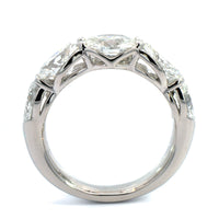Platinum Shared Prong Oval Cut Graduating Diamond Band