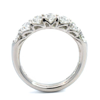 Platinum Shared Prong Graduating Oval Diamond Band