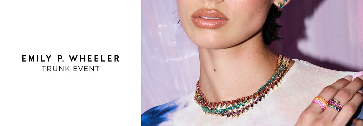 Promotional image for the Emily P. Wheeler Trunk Event, featuring a model wearing a multi-strand beaded necklace with red, green, and gold beads, along with matching rings and earrings.