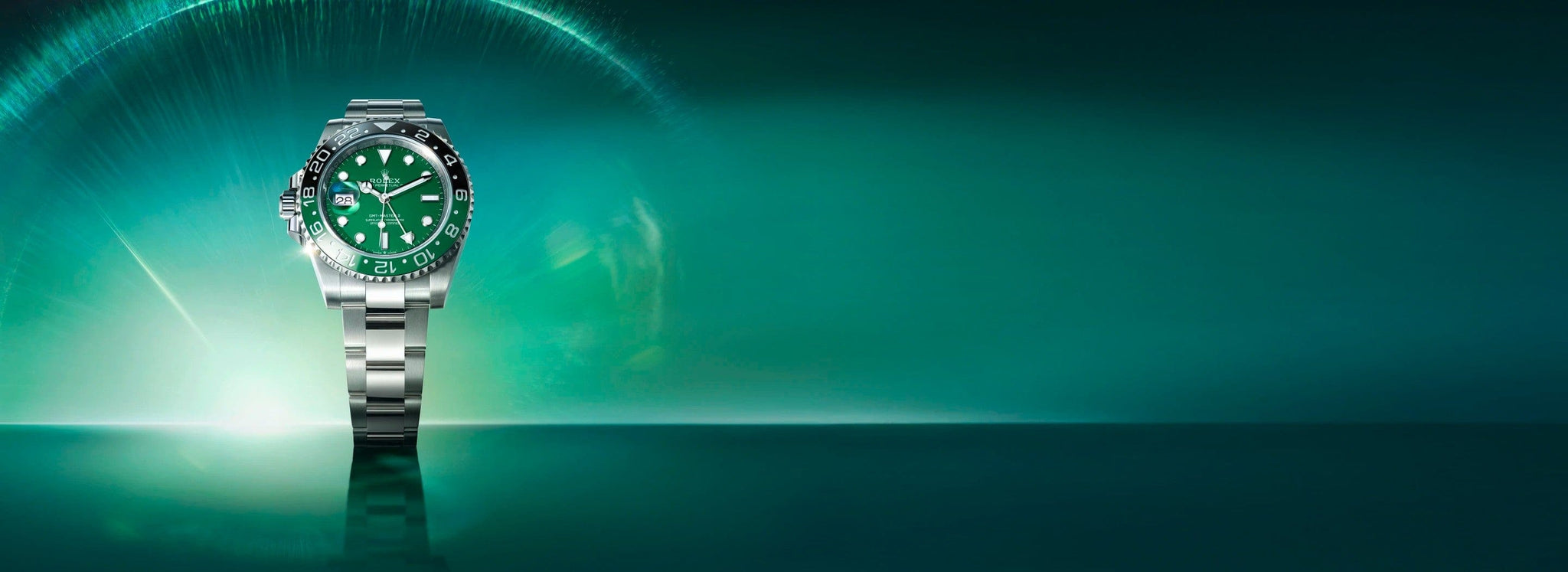 Rolex GMT-Master II on green background