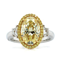 Platinum Oval Cut Fancy Yellow Diamond Engagement Ring