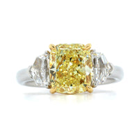 Platinum and 18K Yellow Gold 3 Stone Fancy Yellow Diamond Ring